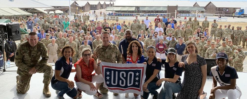 Army Command Sgt. Maj. Christopher Kepner, senior enlisted advisor to the chief of the National Guard Bureau; Toni Trucks; Sally Lengyel; Air Force Gen. Joseph Lengyel, chief, National Guard Bureau; Quinton “Rampage” Jackson; Laura Bryna; Anjelah Johnson; Cassadee Pope; Mayim Bialik; and Nia Franklin pose for a photo after a USO performance, Camp Bondsteel, Kosovo, July 4, 2019. [U.S. Army National Guard photo by Sgt. 1st Class Jim Greenhill]